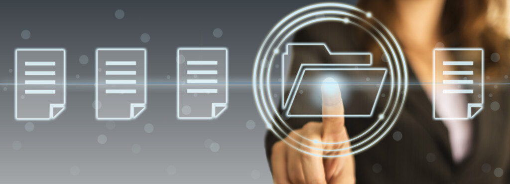 Finger touching loading file button on a touch screen